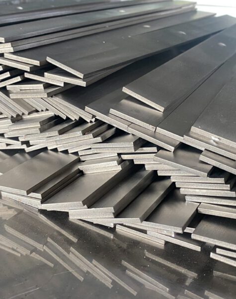 Stack,Of,Stainless,Steel,Flat,Bar,Of,Background. Stack,Of,Stainless,Steel,Flat,Bar,Of,Background.